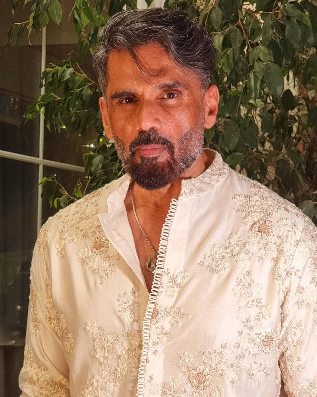 Albescent White Embroidered Kurta Pyjama Set.