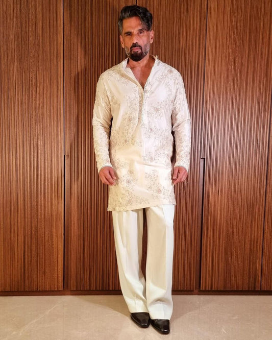 Albescent White Embroidered Kurta Pyjama Set.