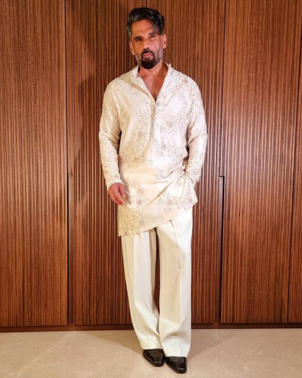 Albescent White Embroidered Kurta Pyjama Set.